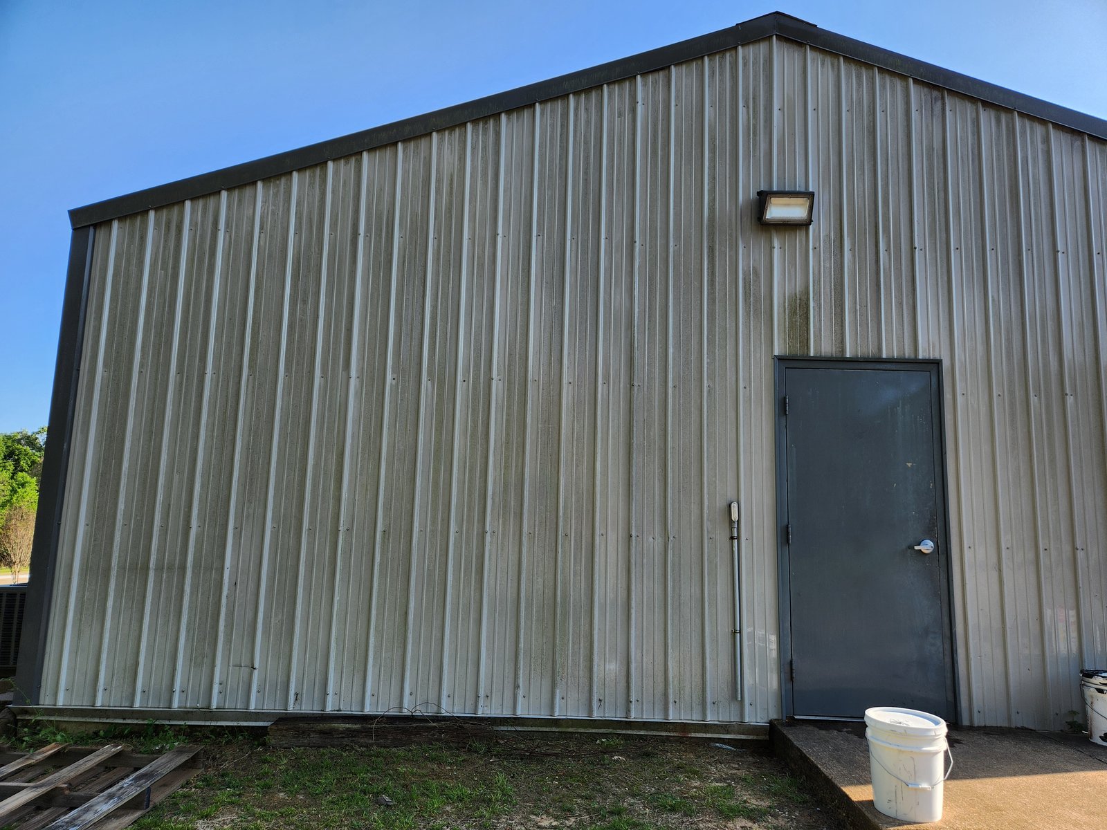 Church side elevation with deep algae staining
