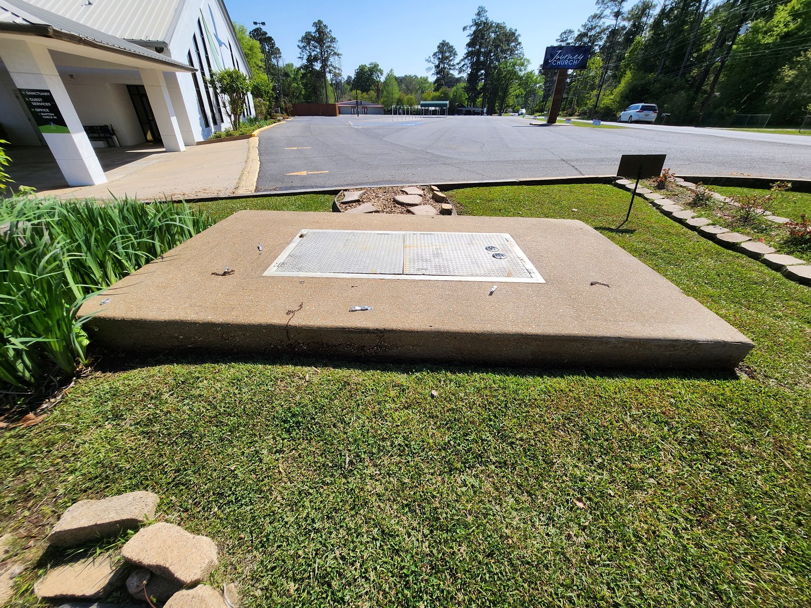 Concrete utility pad after cleaning, bright clean
